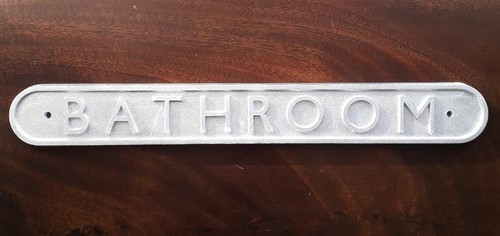 Cast aluminium bathroom sign - cast,