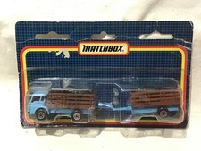 MATCHBOX TWIN PACK  - BLUE DODGE CATTLE TRUCK & TRAILER - ON CARD
