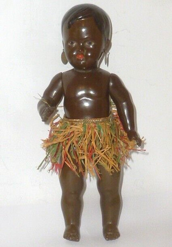 Old colored dark cellba doll - old,