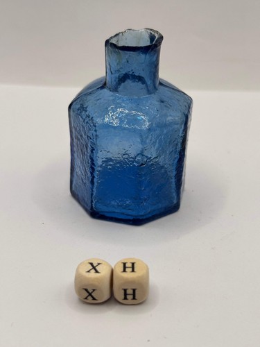 Old blue glass ink bottle