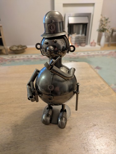 Quirky scrap metal art money - quirky,