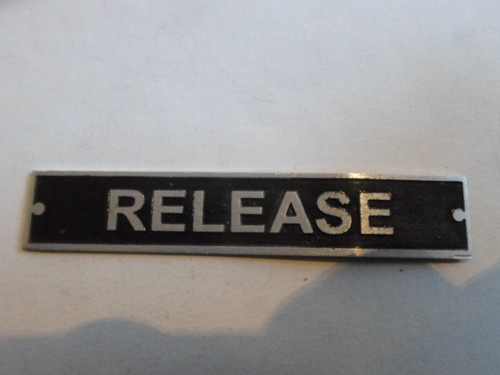 Nameplate sign release - release, jeep