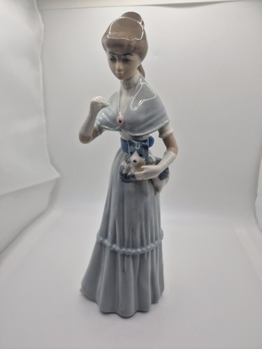 Casades porcelain figurine - casades,