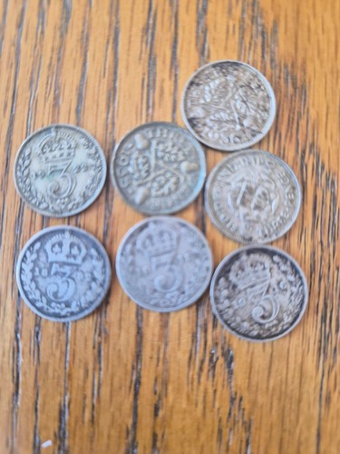 Silver three penny coins.