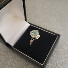 Colombian Emerald & Zircon Halo Ring in Platinum over Sterling Silver