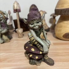  Pixie on a mushroom By David