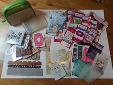 Cuttlebug machine + 100 sets