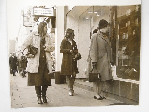 Women window shopping - window, high