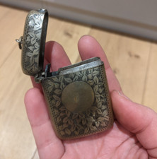 Antique Vesta engraved silver plated match holder with striker plate on base