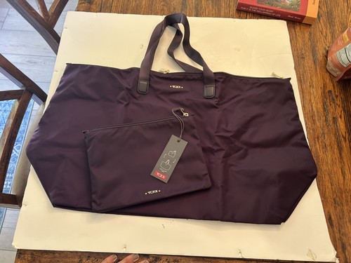 New tumi just case purple - new,