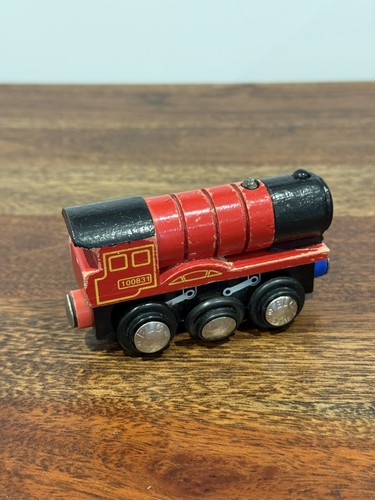 Vintage red wooden steam train - red,