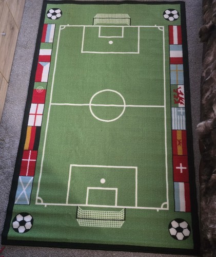 Football rug never used - never,