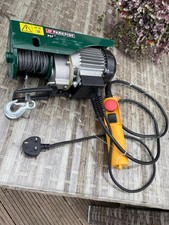 space saving electric lift up bed custom made for a studio flat or motorhome