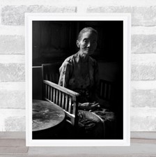 Old Woman On Wooden Chair By