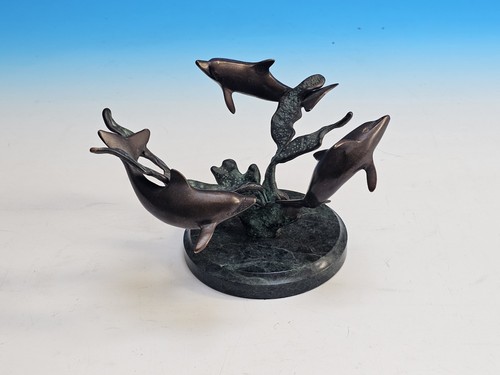 Bronze swimming dolphins - ?,