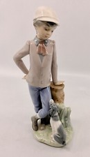 LLADRO/NAO BOY WITH PUPPY SH2