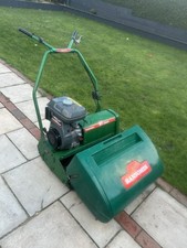 Ransomes 61 marquis lawnmower with sit on roller
