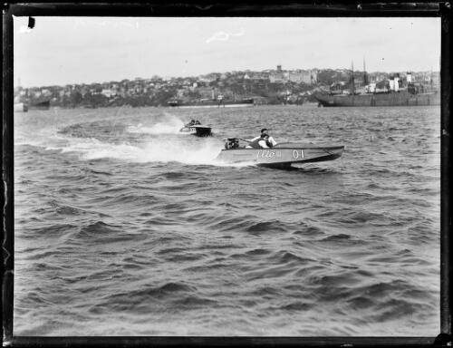 Two outboard motor boats