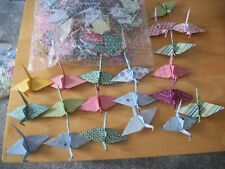 50 handmade origami cranes in