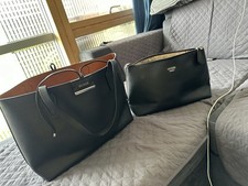 A stylish black leather Guess
