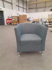 Tub chair with sea green patterned fabric