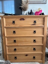 wooden chest of drawers with