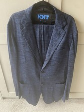 KNT Kiton Blue melange suit with a texture inspired by the contemporary Style