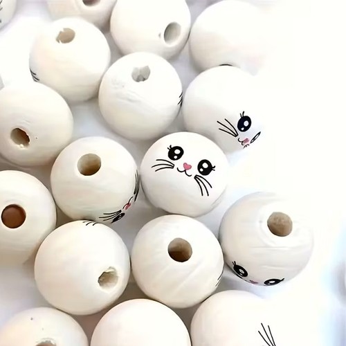 Wooden doll head beads - x,
