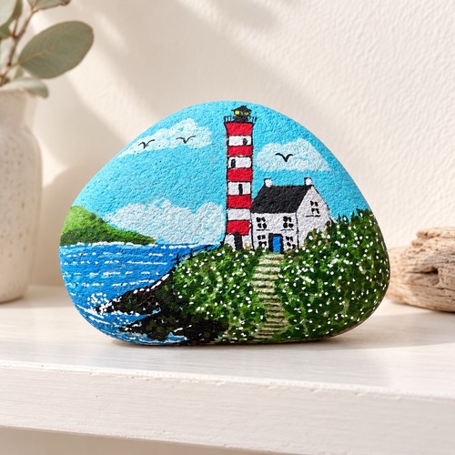 Hand painted lighthouse pebble - hand,