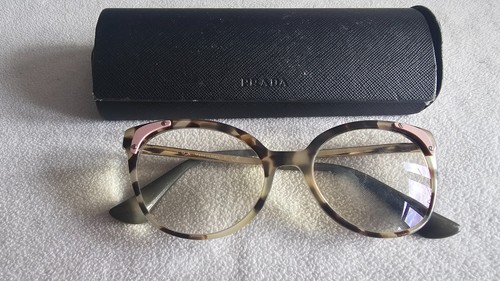 Prada brown gold cat - /,