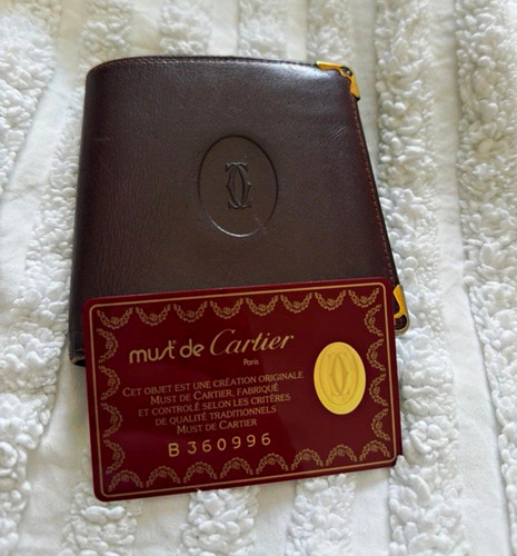 Cartier must brown - de,