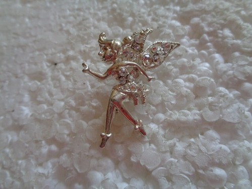 Fairy shaped silver coloured