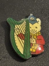 Vintage Rupert Bear Wearing  Police Helmet And Playing Harp Pin Badge