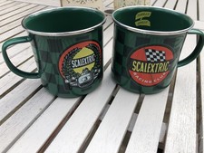 Pair of Scalextric Racing Club enamel mugs