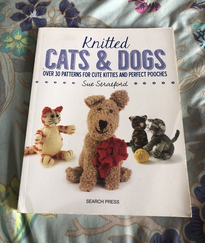 Knitted cats and dogs over - knitted,