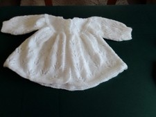 hand knitted matinee coat in white
