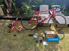 BTWIN TRIBAN 3 ROAD BIKE  WITH ULTRA TRAINER