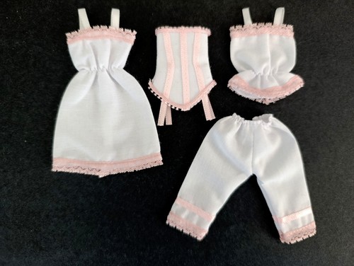 Dolls house clothes - house,