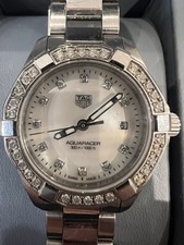 Ladies Tag Heuer Aquaracer. Mother of pearl. Full Diamond Bezel, with box etc