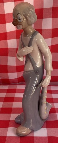 Old clown with - old, saxophone