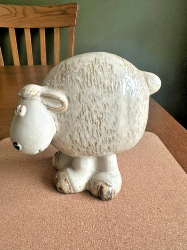 Whimsical glazed pottery sheep