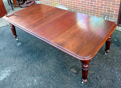 Antique extending dining table
