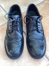 Clark’s black leather brogue