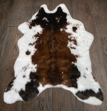 Cowhide tricolour rug never