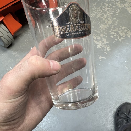 Theakston black label pint - label,