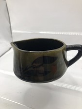 Small dark green jug 3" dia x 1.5" deep