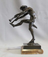 Antique bronze of a boy