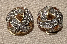 Large vintage clip earrings, gold tone with very sparkly knot cluster.