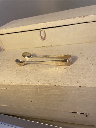 Pair solid silver sugar tongs - solid,