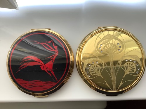 Two powder compacts - two,